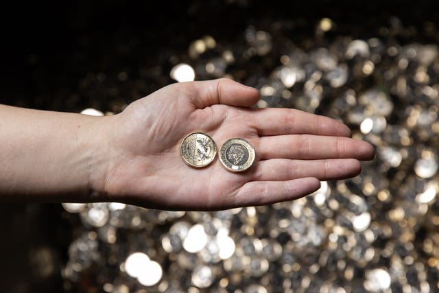 <p>The new £1 coin which is now in circulation (Royal Mint/PA)</p>